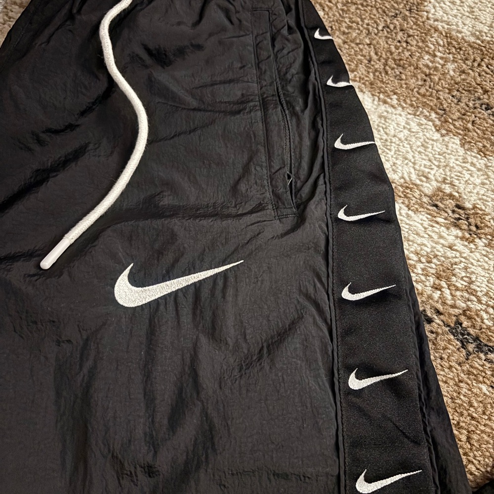 Nike Black Wind-Pant Joggers with White Accents - Picture 2 of 11